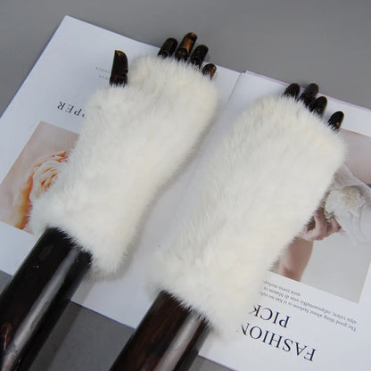 Stylish mink fur gloves with a unique half finger design, combining luxury and comfort for chic women.