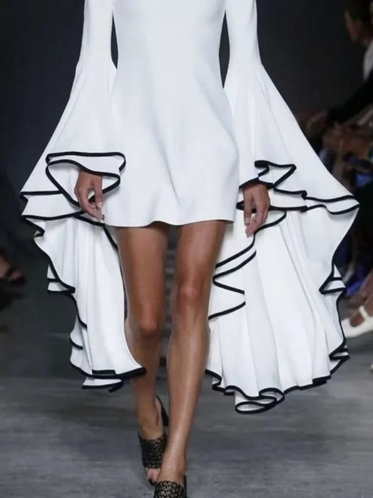 Chic women's A-line mini dress crafted from premium polyester and spandex, emphasizing a flattering silhouette with an empire waist and stylish flare sleeves, ideal for autumn occasions.