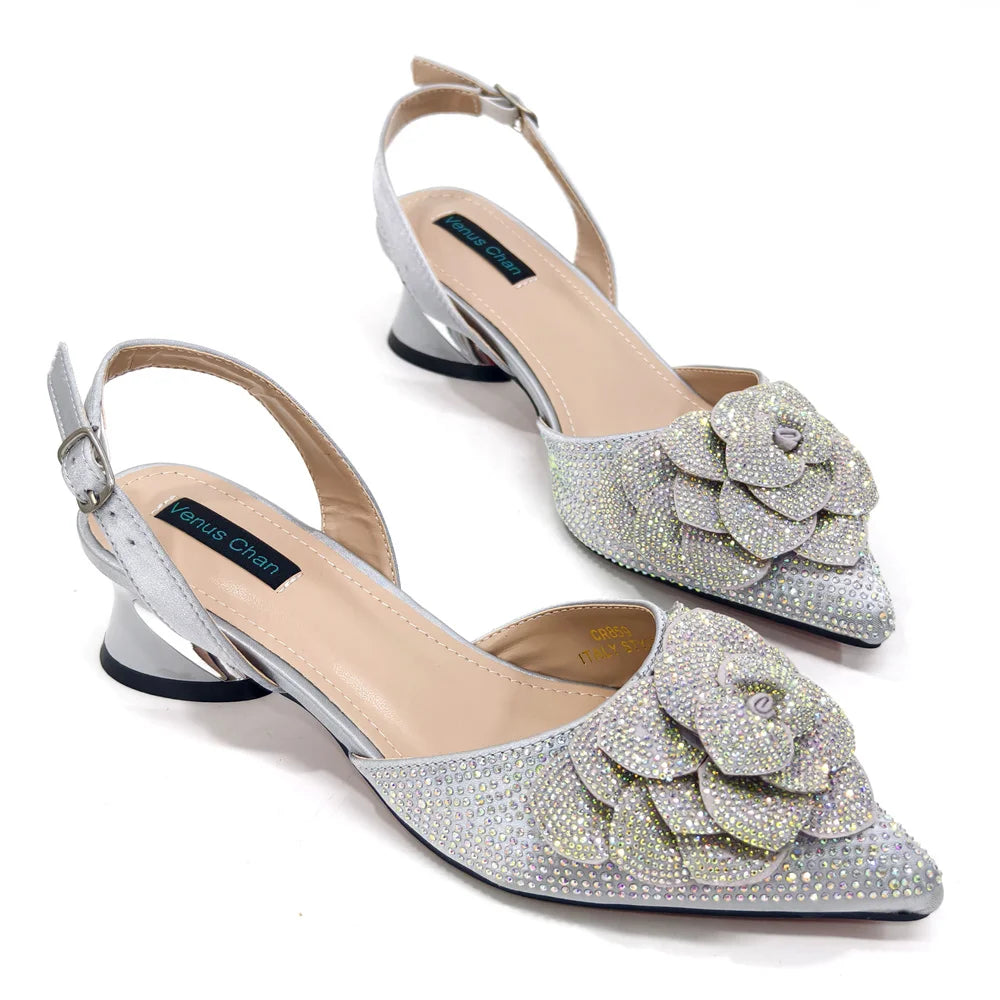 Sophisticated display of the complete women's pointed-toe pump and bag set, emphasizing the trendy floral design and luxurious craftsmanship for stylish women.