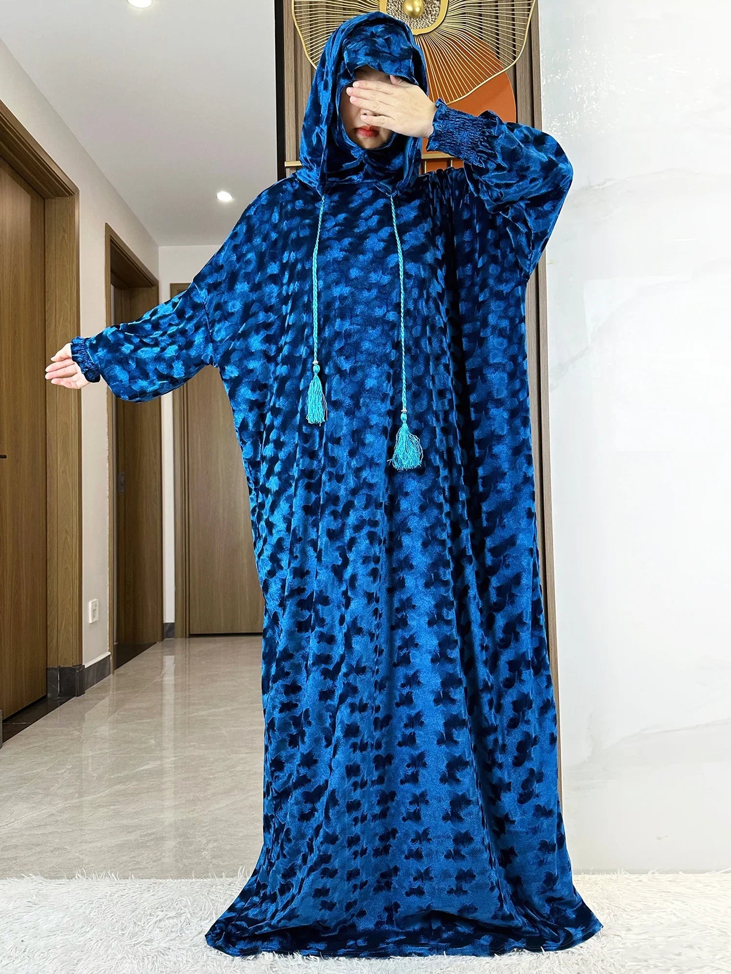 Elegant and sophisticated Islamic kaftan dress made from high-quality velvet fabric, featuring loose fit and standard thickness for all-season wear.