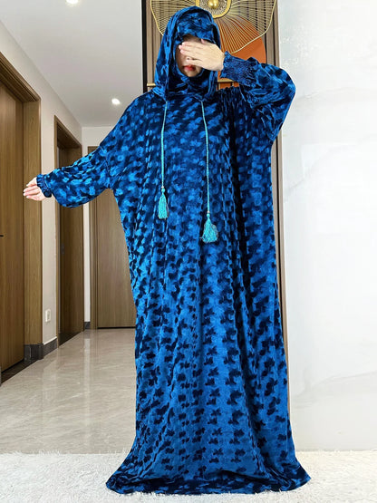 Elegant and sophisticated Islamic kaftan dress made from high-quality velvet fabric, featuring loose fit and standard thickness for all-season wear.
