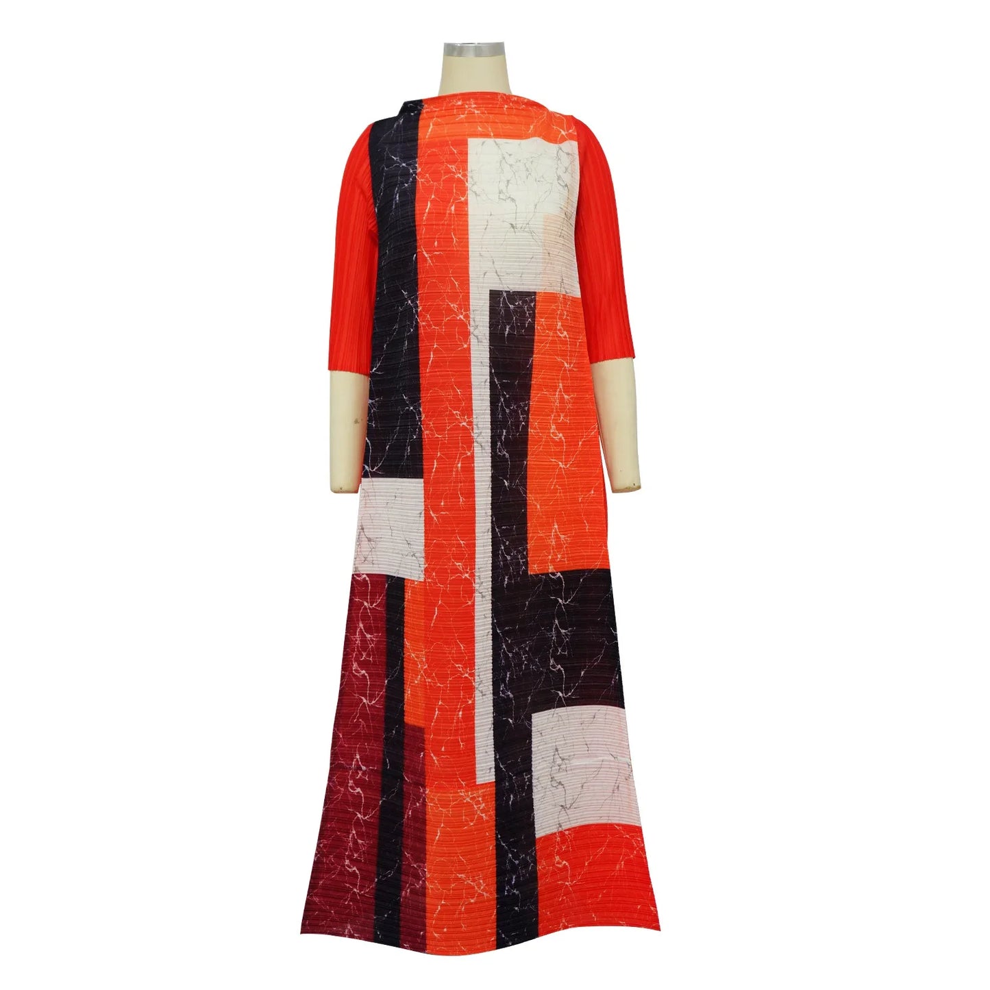 Close-up view of the luxurious polyester fabric of the African dashiki dress, showcasing vibrant colours including red, army green, and purple for a bold statement.