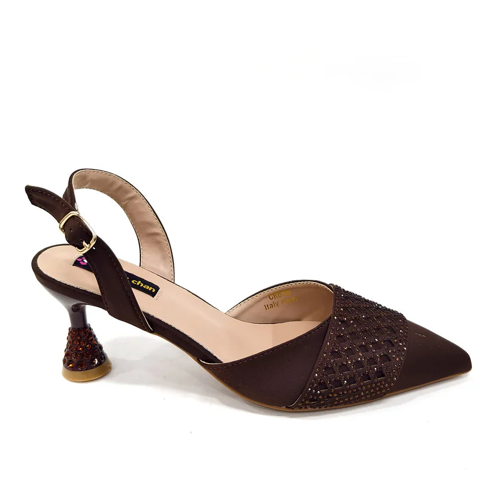 Luxurious women's shoe and bag set, designed for formal occasions, featuring exquisite craftsmanship and glamorous embellishments.