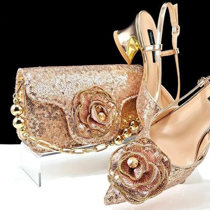 Stylish gold evening handbag adorned with floral details, a perfect complement to wedding attire.