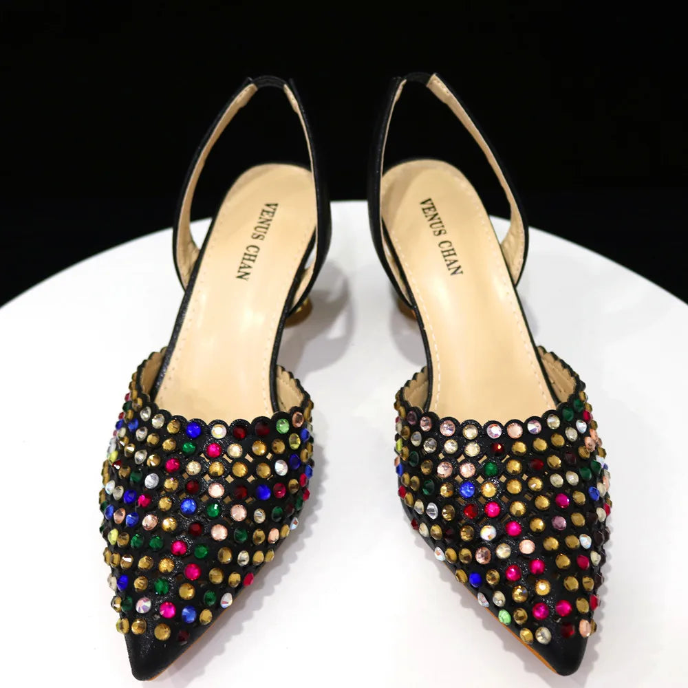 Elegant Venus Chan pointed toe high heels in a stunning green finish, designed for fashion-forward women attending upscale events.