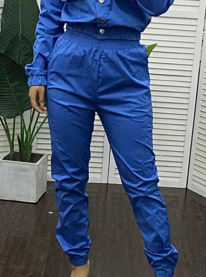 Full view of the elegant denim-style tracksuit ensemble for women, featuring a sophisticated long sleeve shirt and high waist pants for a luxurious look.