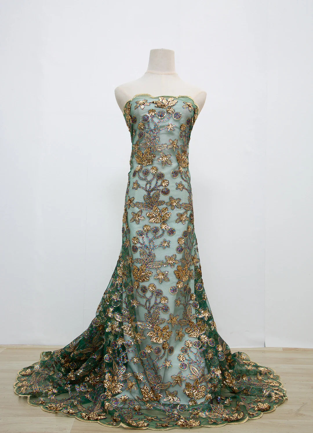 Elegant close-up of Kalume sequined lace fabric showcasing intricate mesh design, ideal for upscale fashion creations.