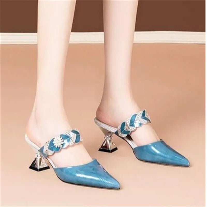 Trendy pointed toe slippers with a geometric pattern, combining modern aesthetics with a classic high-heel silhouette, perfect for fashion-savvy women.