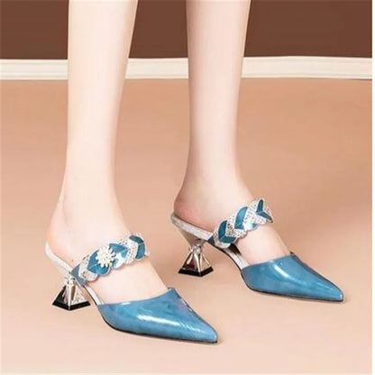 Trendy pointed toe slippers with a geometric pattern, combining modern aesthetics with a classic high-heel silhouette, perfect for fashion-savvy women.