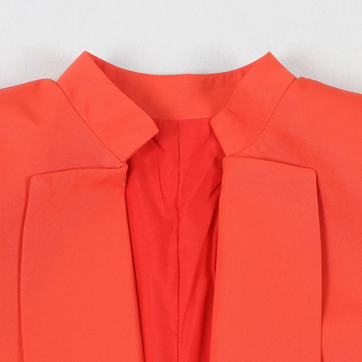 Stylish office lady outfit, blending a solid colour blazer and wide leg trousers, delivering a sophisticated attire for middle-aged women seeking luxury and comfort.