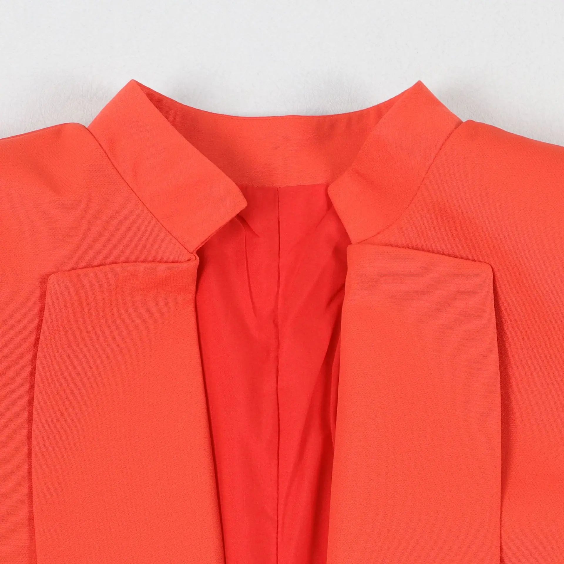 Stylish office lady outfit, blending a solid colour blazer and wide leg trousers, delivering a sophisticated attire for middle-aged women seeking luxury and comfort.