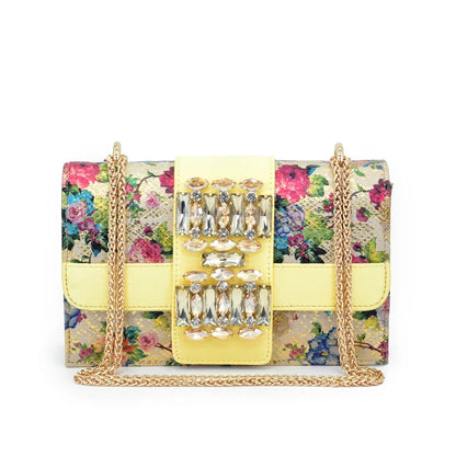 Sophisticated purple peep toe pumps beautifully matched with a chic handbag, exuding luxury for weddings and parties.