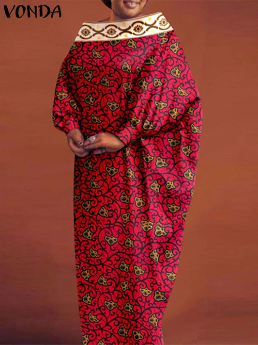 Elegant women's bohemian maxi dress featuring luxurious batwing sleeves, designed for a loose fit and ankle-length elegance in a beautiful print.