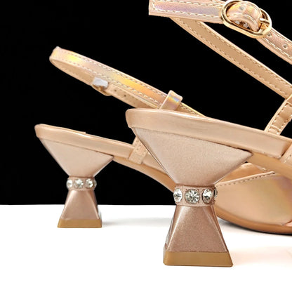 Elegant women's high-heeled party shoes adorned with rhinestones, showcasing a pointed toe design, complemented by a chic black and gold handbag.