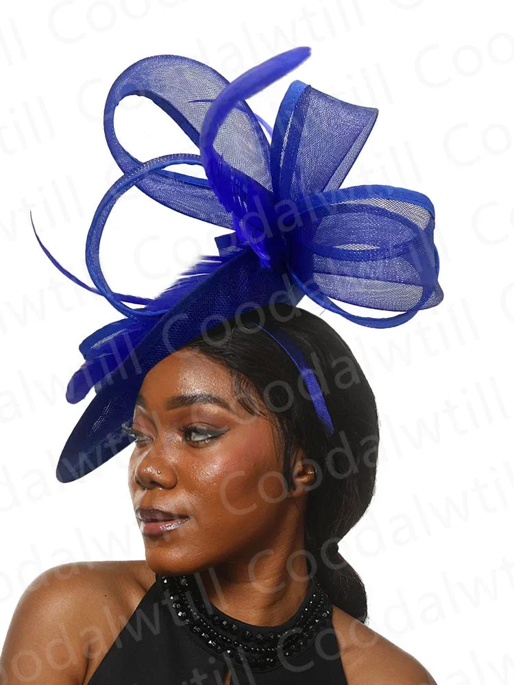 Chic grey fascinator pillbox cap, ideal for derby events and high-class gatherings, offering a timeless fashion statement for discerning women.