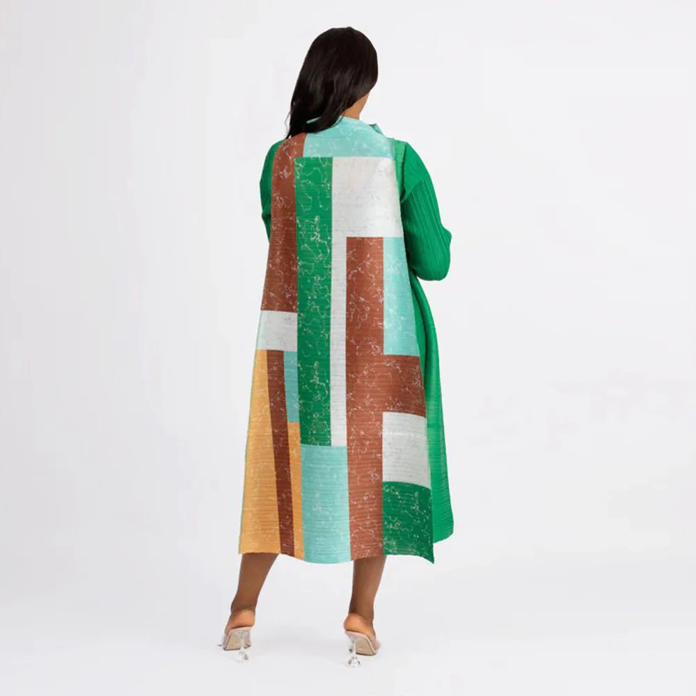 Close-up of the textured fabric details on the plus size African dress, highlighting the craftsmanship and vibrant color options suitable for various occasions.