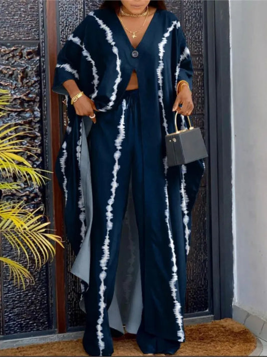 Chic outfit featuring a sophisticated V-neck blouse with three quarter sleeves, designed for a modern woman who appreciates style and comfort.