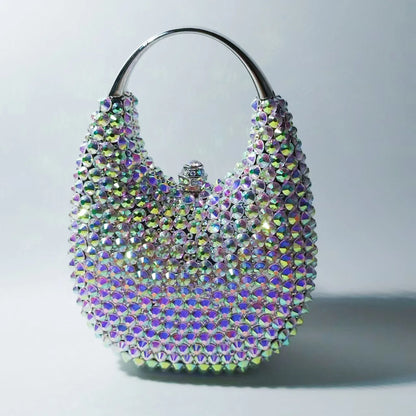 Elegant women's minaudiere evening clutch bag featuring a luxurious metallic finish adorned with sparkling crystal diamonds, perfect for sophisticated occasions.