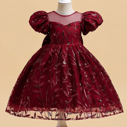 Elegant knee-length ball gown in a stunning patchwork design, tailored for young girls, ideal for special events and celebrations.