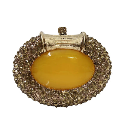 Luxury women's metallic clutch bag adorned with sparkling crystals, ideal for elegant evening outings and parties.