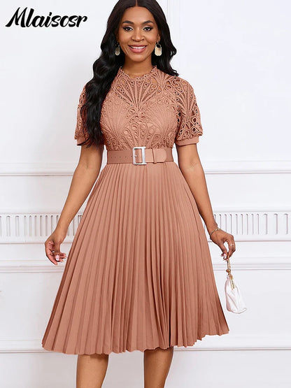 Model wearing Mlaiscsr Luxury Pleated Dress with a stylish belt, highlighting its empire waistline and sophisticated silhouette for women.