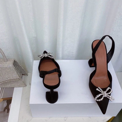 Fashionably designed women's rhinestone bow sandals with super high heels, combining style and comfort for extraordinary occasions.