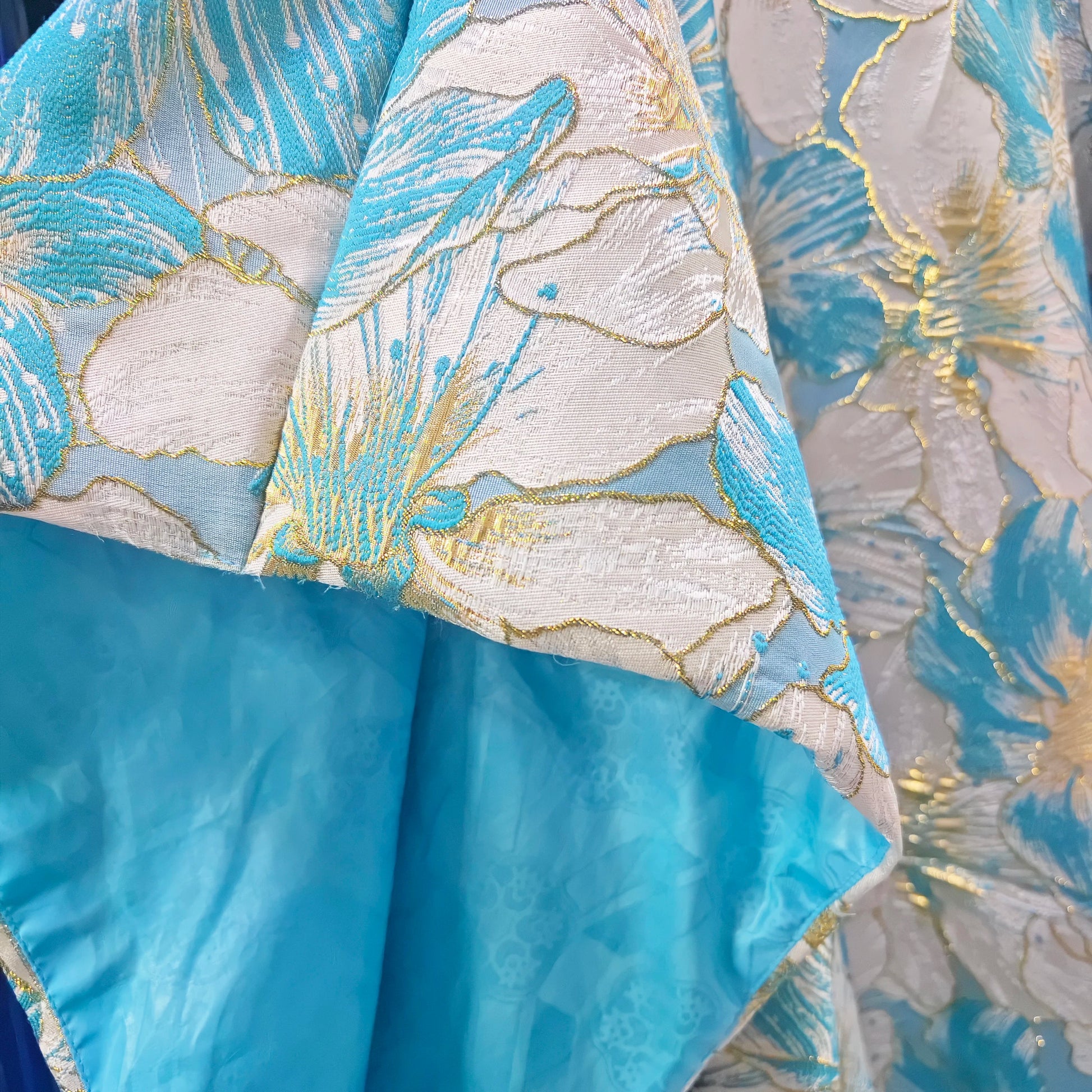 Sophisticated African brocade boubou dress in various colors, designed for women who appreciate elegance and cultural heritage in luxury fashion.