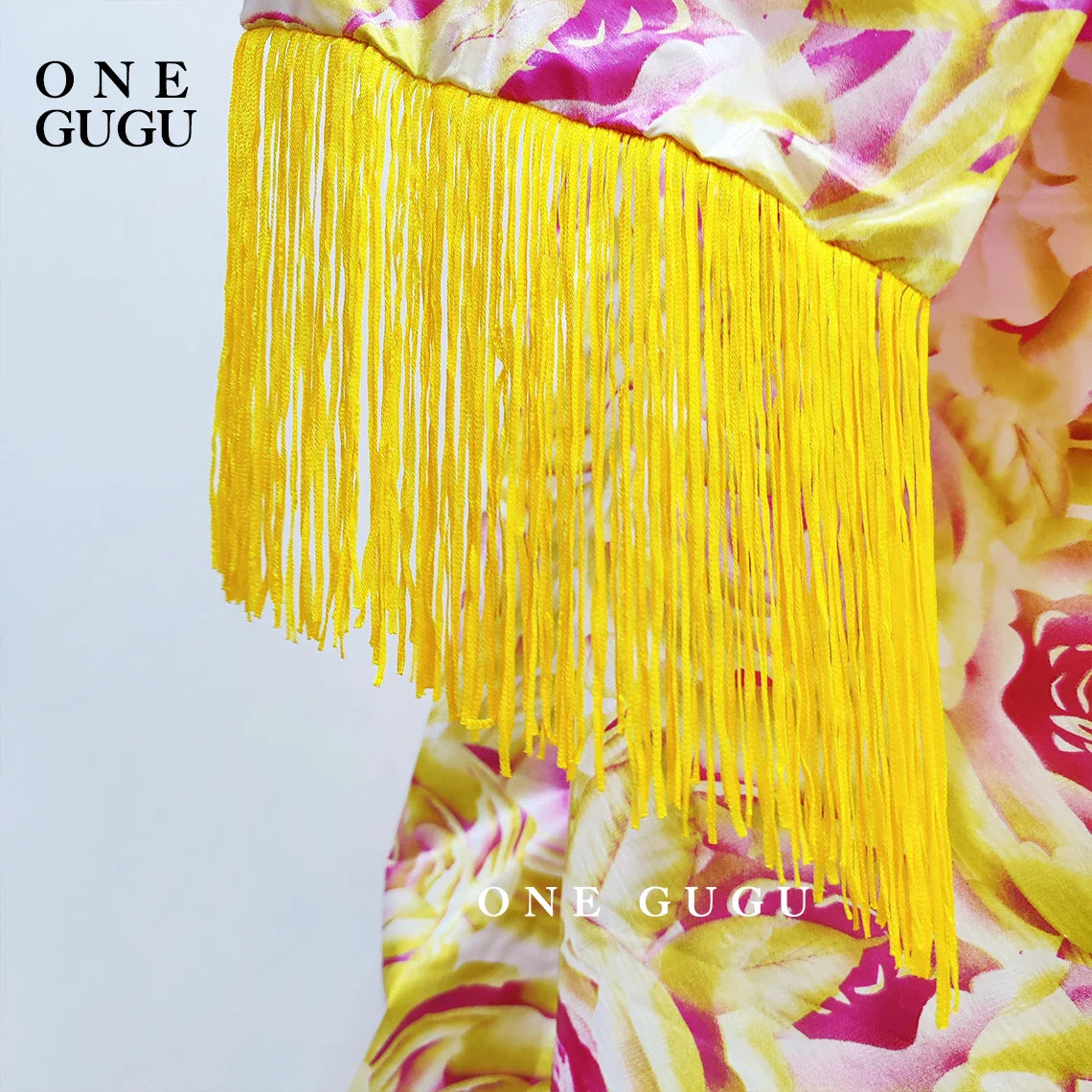 Elegant blue Bazin Riche African Dashiki wedding gown featuring an exquisite tassel shawl, ideal for women seeking traditional yet luxurious attire.