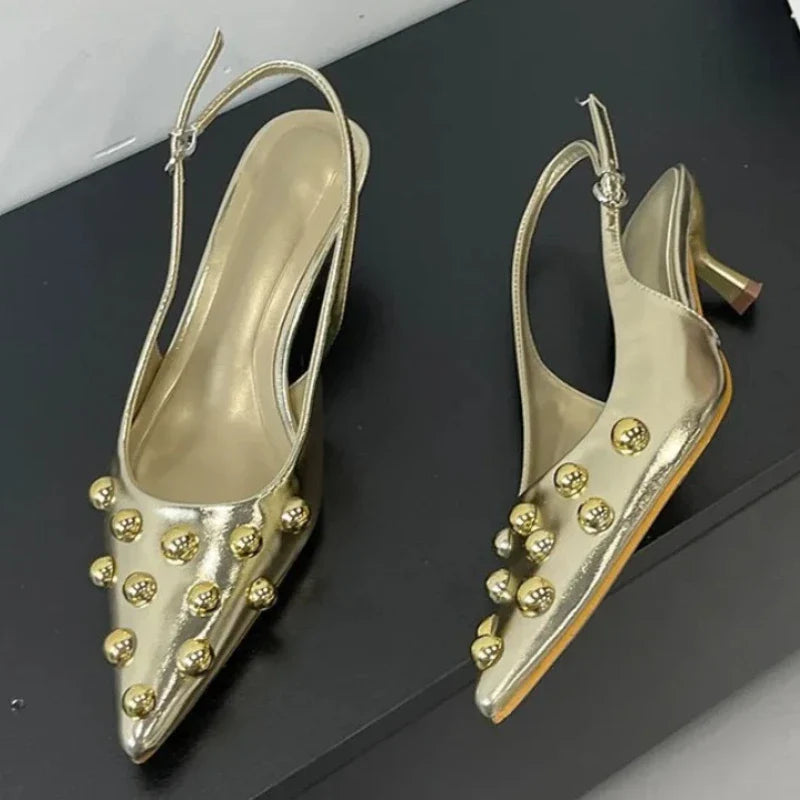 Luxury fashion rivet design high-heeled sandals for women featuring a sexy pointed toe and stylish back strap, perfect for summer occasions.
