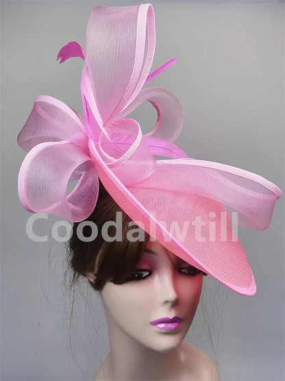 Chic and stylish grey fascinator hat for women, designed for upscale events like Royal Ascot and derby races.