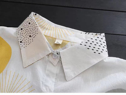 Stylish mid-length women's blouse, offering sun protection with a sophisticated vibe suitable for daytime and evening wear.