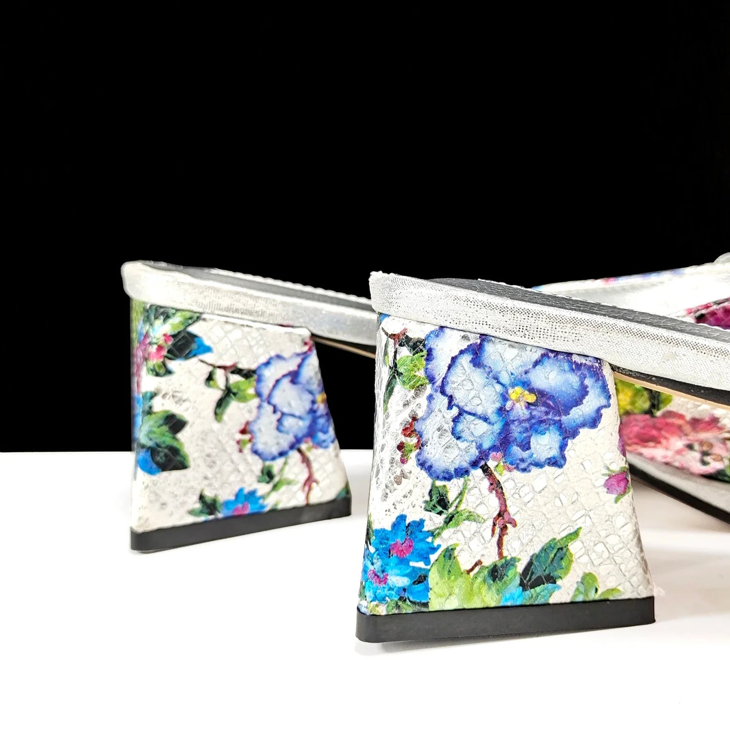 Chic women's slip-on heels in purple with dazzling rhinestone accents, designed for comfort and style.