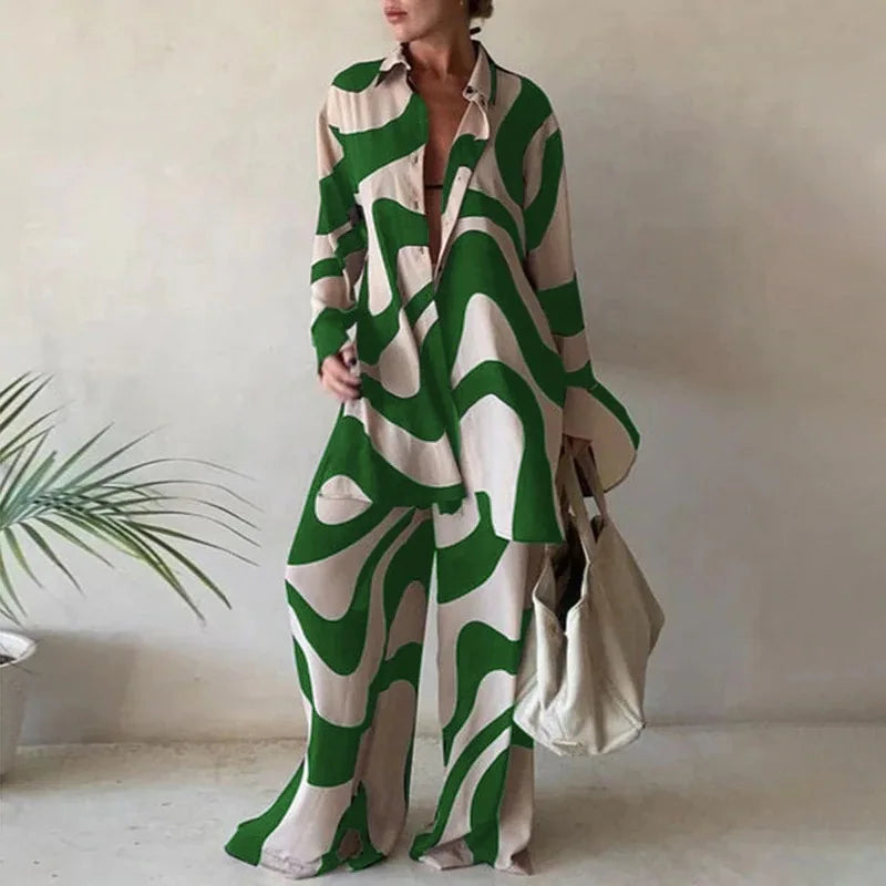 Elegant women's two-piece casual set featuring a long sleeve lapel top and wide leg trousers, adorned with a sophisticated printed design, perfect for stylish spring and summer outings.