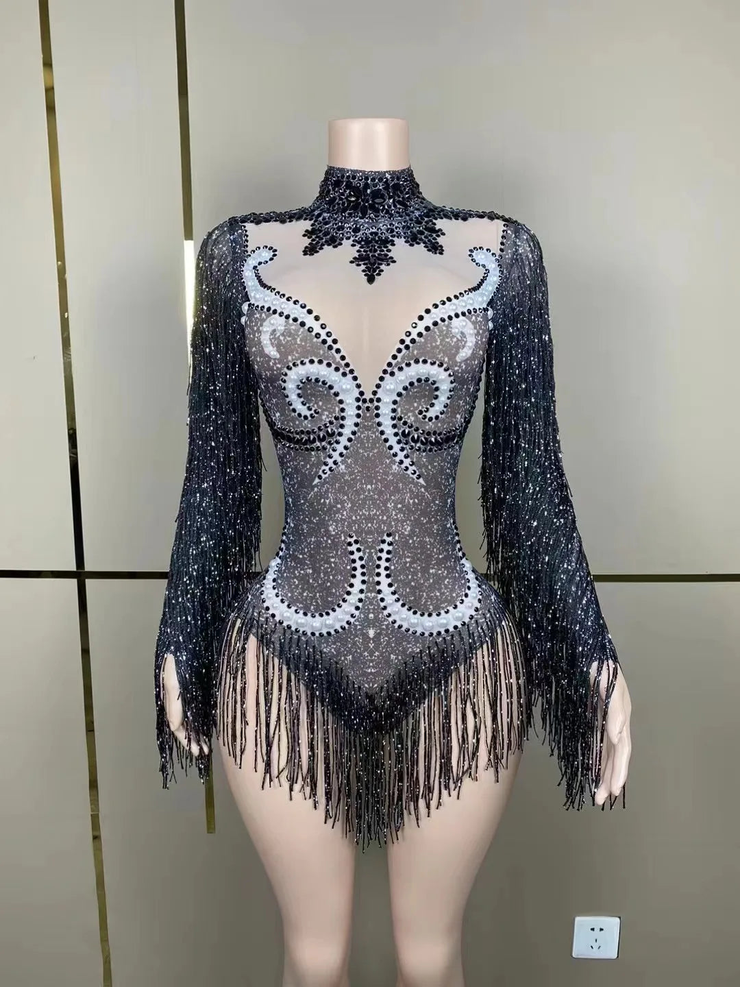 Side angle view of a woman's Luxury Cha-Cha Dance Practice Suit, highlighting the graceful movement of the fringe and flattering silhouette.