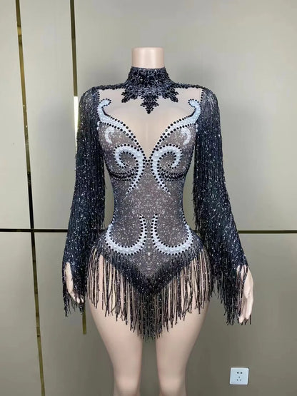 Side angle view of a woman's Luxury Cha-Cha Dance Practice Suit, highlighting the graceful movement of the fringe and flattering silhouette.