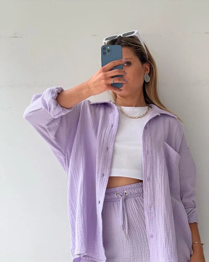 Sophisticated drawstring wide-leg shorts in a lush grass green, part of the women's luxury 2-piece set for comfortable summer wear.