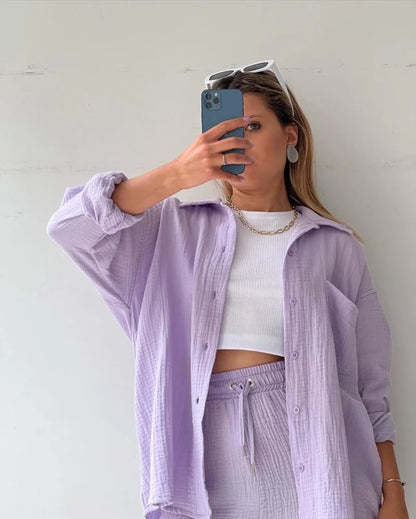 Sophisticated drawstring wide-leg shorts in a lush grass green, part of the women's luxury 2-piece set for comfortable summer wear.