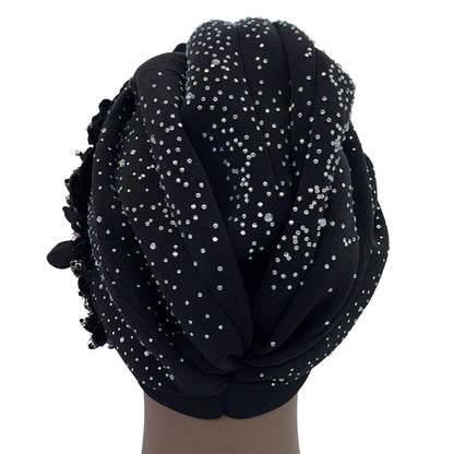 Chic African turban cap displaying exquisite jewel accents, a perfect blend of elegance and style for women, tailored for casual or formal occasions.