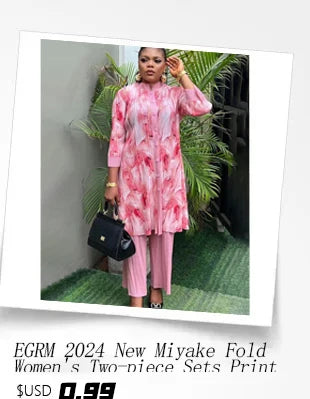 Full view of the complete EGRM Luxury Plus Size batwing sleeve top and printed pleated skirt set, perfect for autumn celebrations.