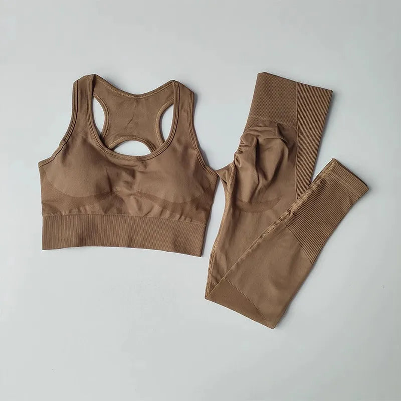 Luxury women's yoga set featuring high waist leggings and a matching sports bra, designed for performance and style.