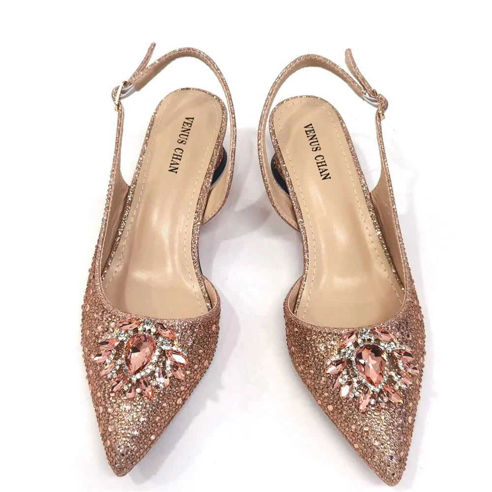 Close-up of the exquisite spike heels and bling fashion element on stylish Italian pumps for women, offering both comfort and elegance.