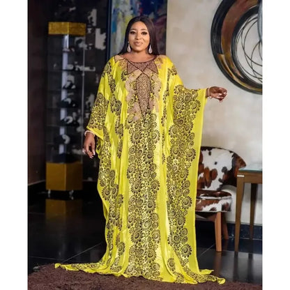 Stunning long sleeve boubou robe in vibrant print, perfect for women seeking stylish African attire.