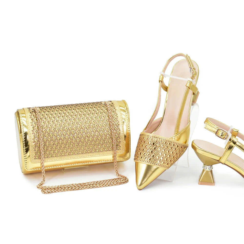 Luxurious silver pointed toe high heel slingbacks and matching bag, showcasing exquisite rhinestone embellishments, perfect for the modern, elegant woman.