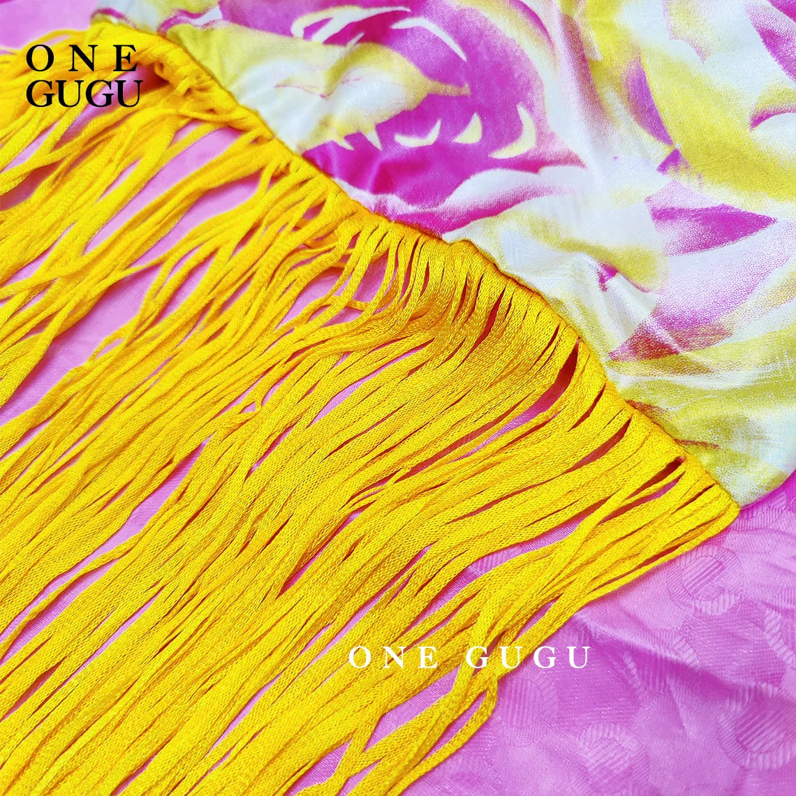 Close-up of the detailed embroidery and embellishments on the luxury blue African Dashiki wedding dress, showcasing exquisite craftsmanship.