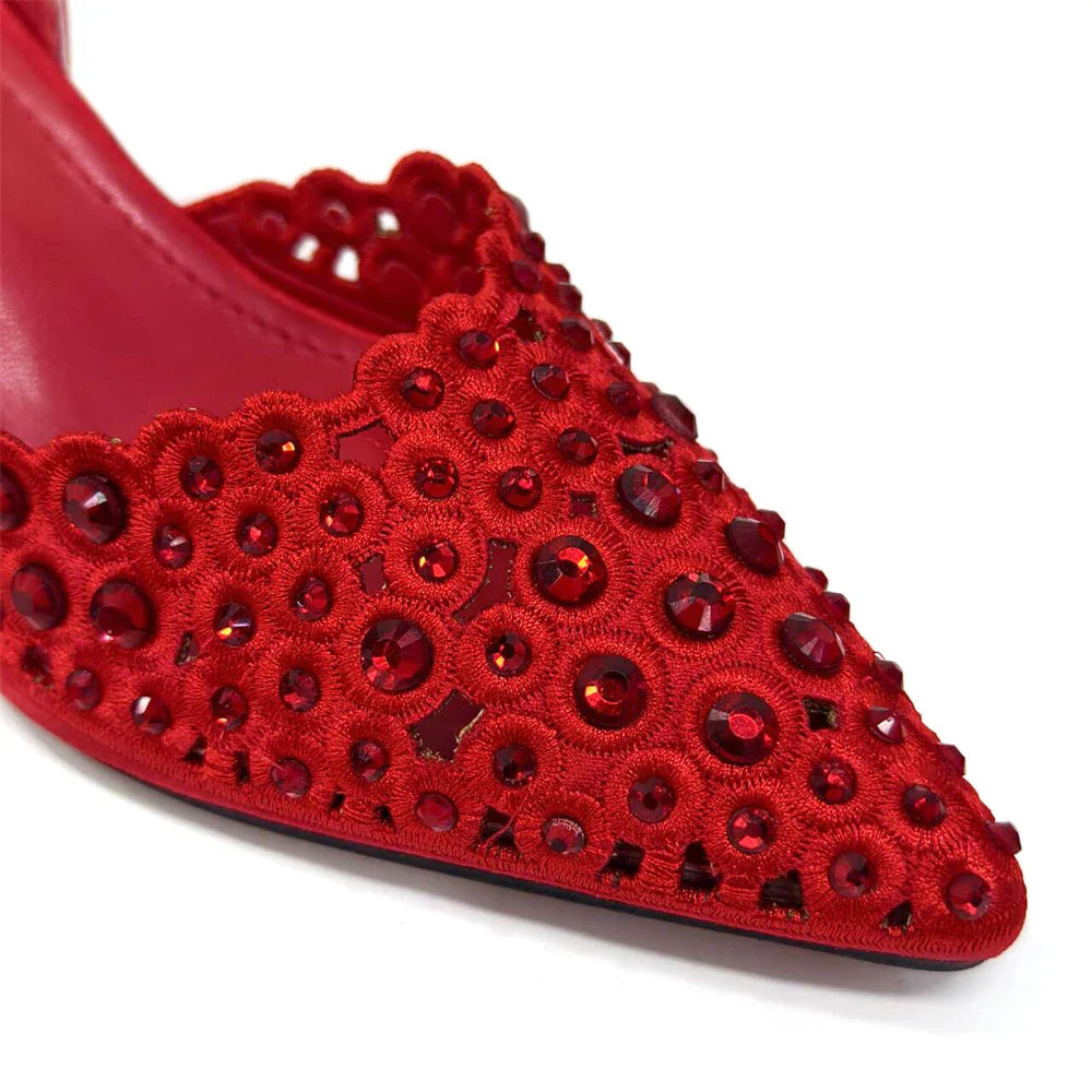 Stylish Venus Chan women's party shoes in gold with spike heels, perfect for formal events, combining comfort and elegance in their design.