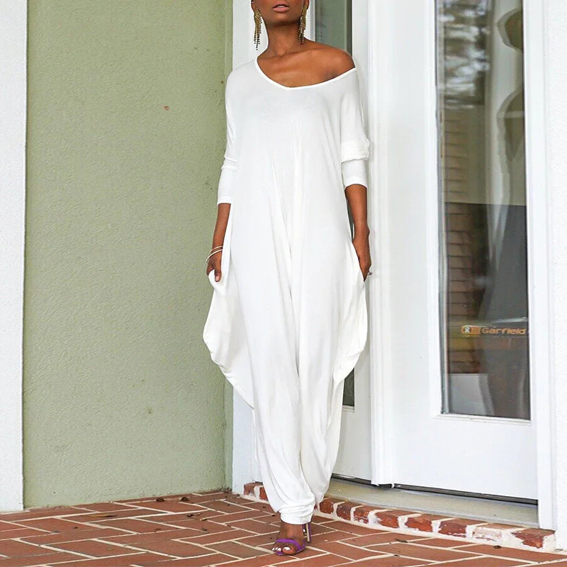 Fashion-forward women's jumpsuit with broadcloth fabric, elegantly designed for transitional autumn/winter dressing.