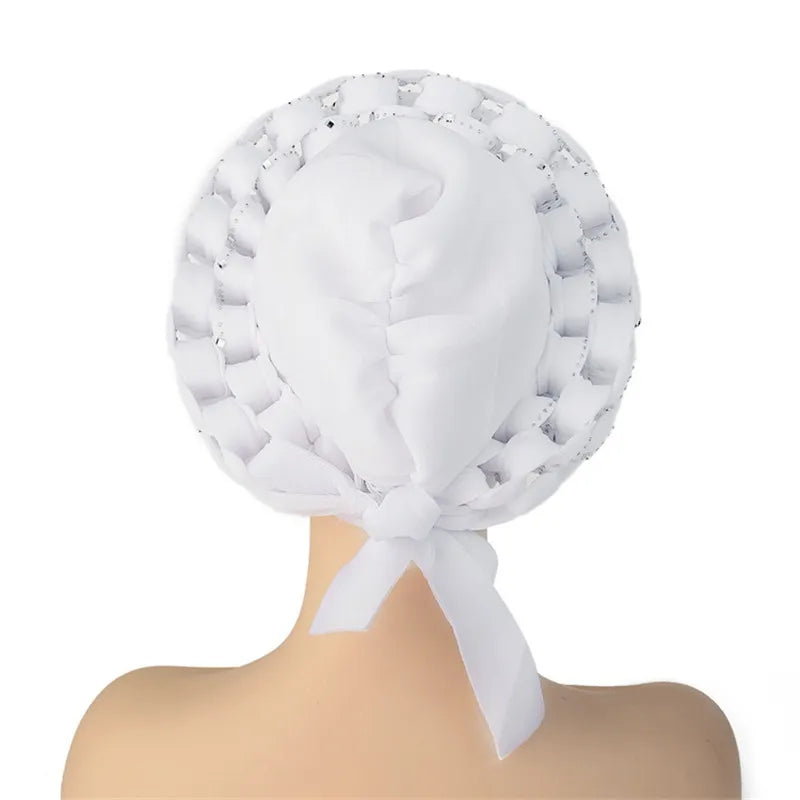 Stylish autogele headwrap adorned with diamonds, merging tradition and contemporary fashion for elegant women.
