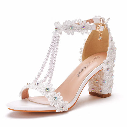 Fashion-forward Luxury Gladiator Sandals for Women in plus sizes, showcasing high heels and unique lace flower accents, suitable for upscale events.