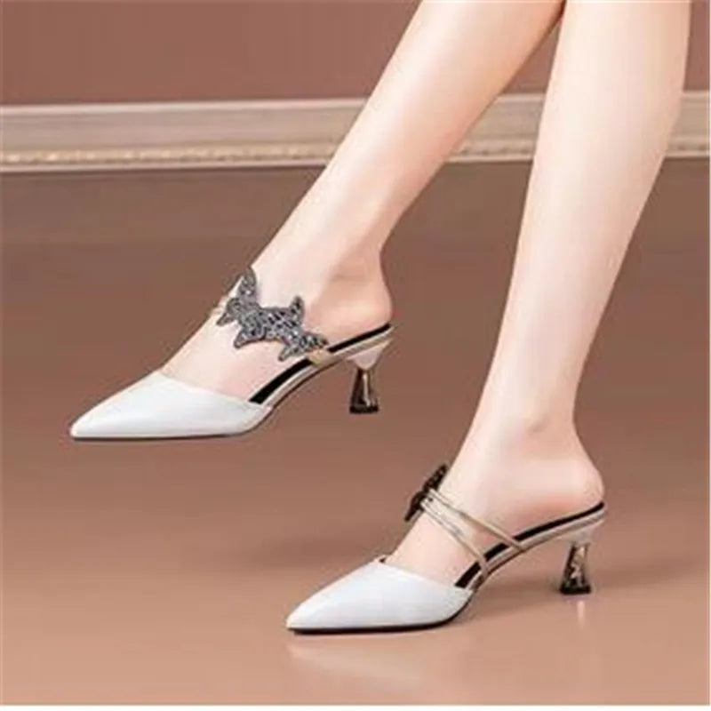 Non-slip high heel women's slippers featuring luxurious pearls, ideal for stylish parties.