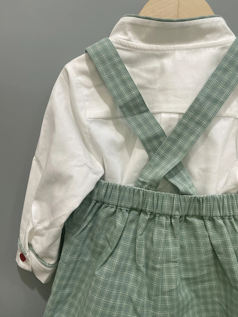 Chic white cotton shirt and green plaid trouser set for toddlers, designed for 1-3 years, blending comfort and luxury in children's fashion.